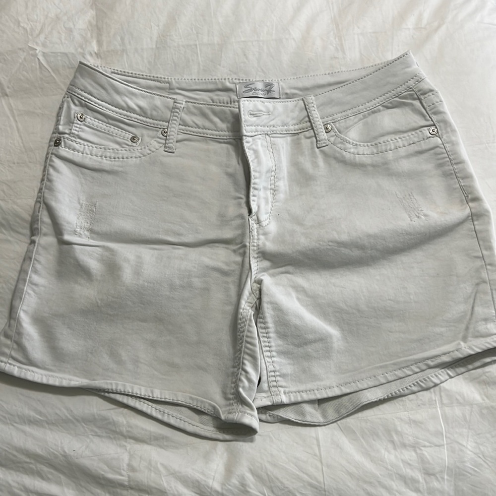 Seven white short shorts